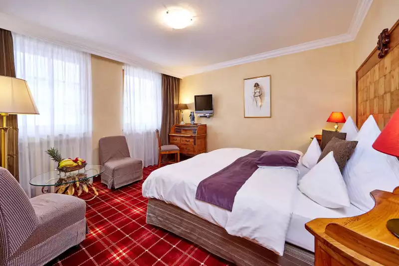 Zimmer und Suiten ansehen